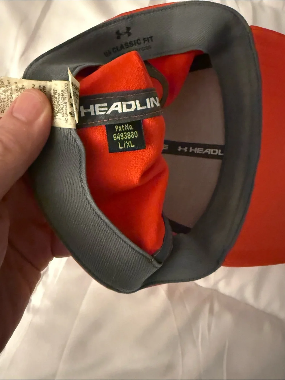 Under Armour Orange Baseball Cap with Black Logo